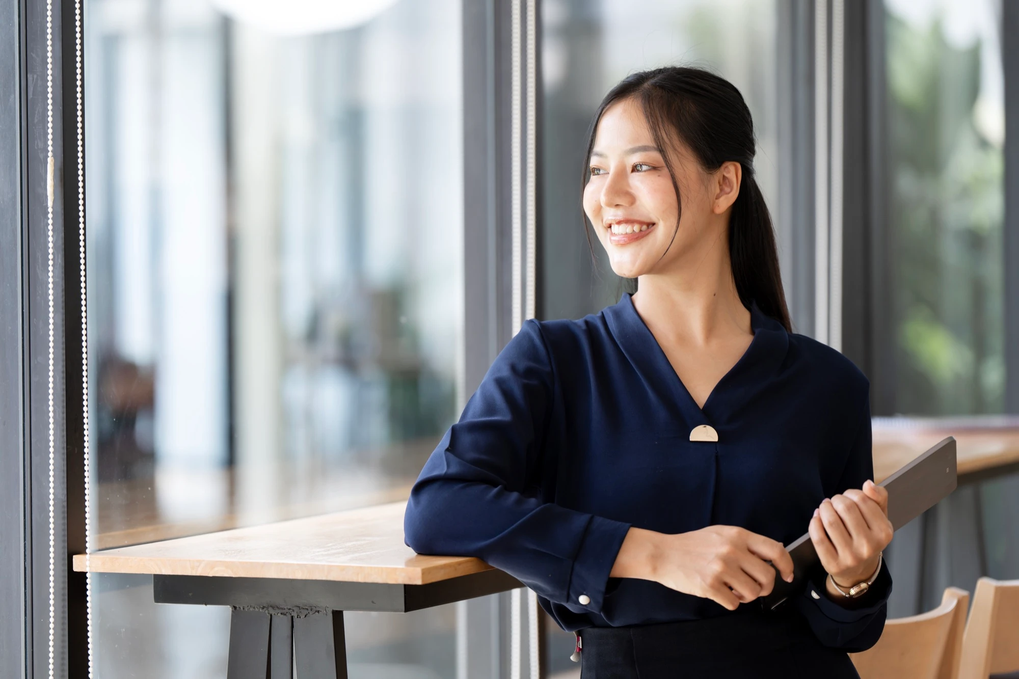 Patient with a bright, confident smile after aesthetic dental care